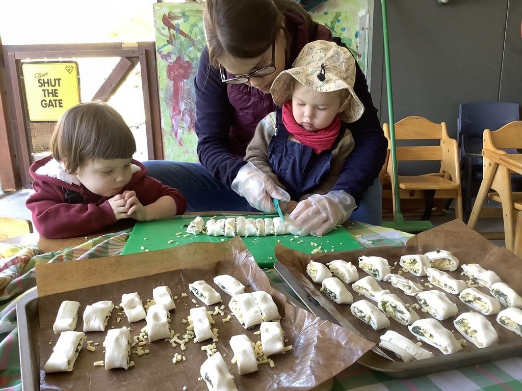 Cheesy Warragal Greens Scrolls prepared by the Bilbys (1-2 year olds)